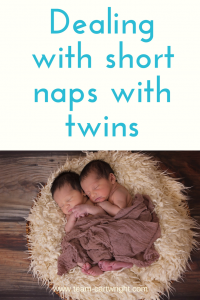 Text: Dealing with short naps with twins. Picture: twin newborns covered in blanket sleeping in fluffy bed