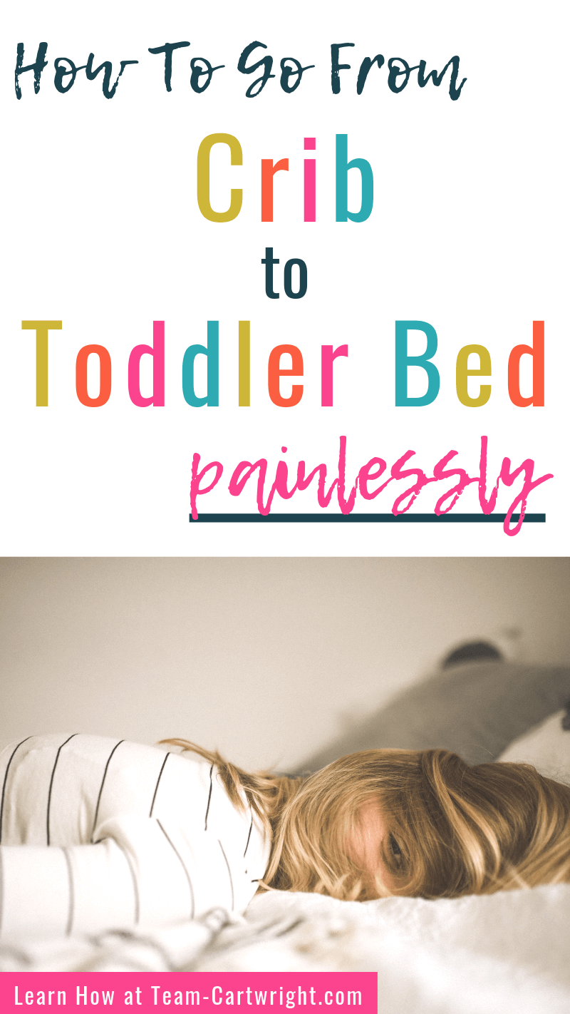 TextL How to go from Crib to Toddler Bed Painlessly  Picture: Girl aying down in bed peeking through her hair covering her face  Bottom Text: Learn How at Team-Cartwright.com