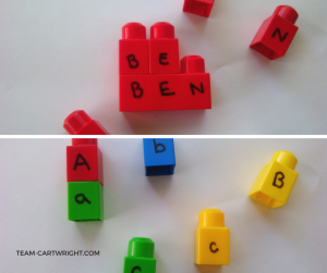 Practicing letters with blocks.