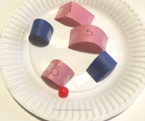 Challenge your child with this fun DIY maze! Create a marble maze with a paper plate to practice number sense, perseverance, hand-eye coordination, and focus. #learning #activity #paper #plate #marble #maze #numbers #preschool #toddler #emotional #development Team-Cartwright.com