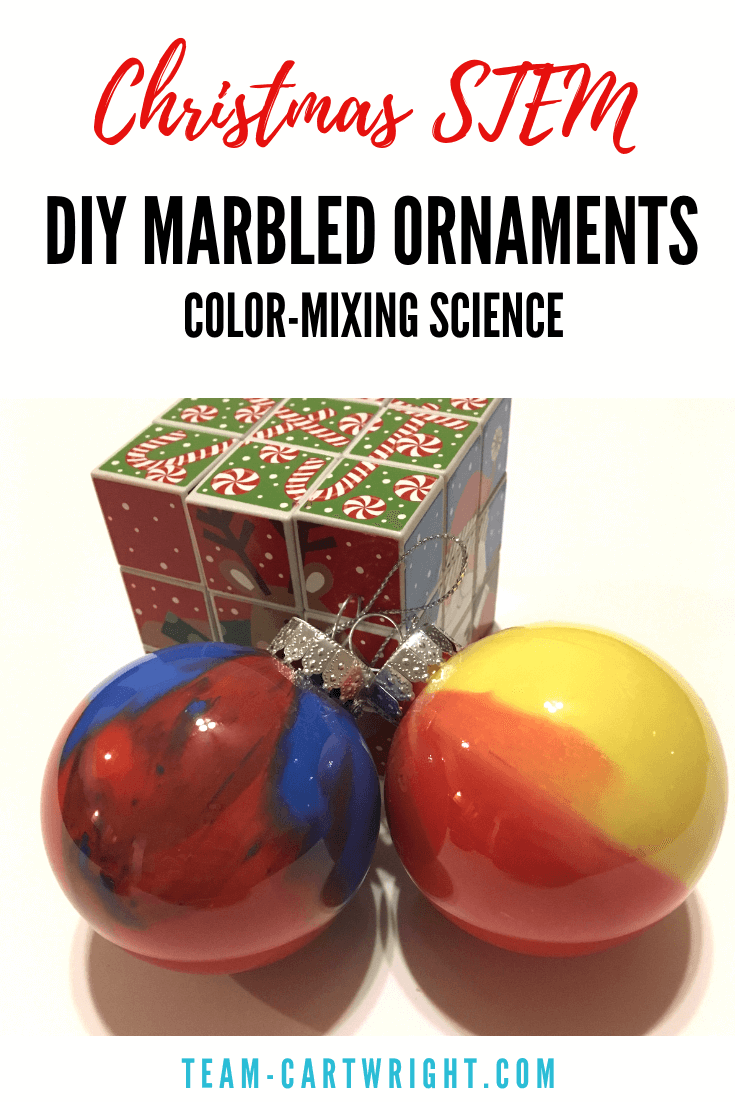 Homemade Marbled Ornaments for Kids! Make these easy and fast ornaments with your preschooler and toddler and have a little STEM fun! Learn about color mixing and make Christmas memories. #christmasSTEM #STEAM #christmascraft #christmasornament #homemadeornament #christmasscience #toddler #preschool #kids #learningactivity #christmaslearning Team-Cartwright.com