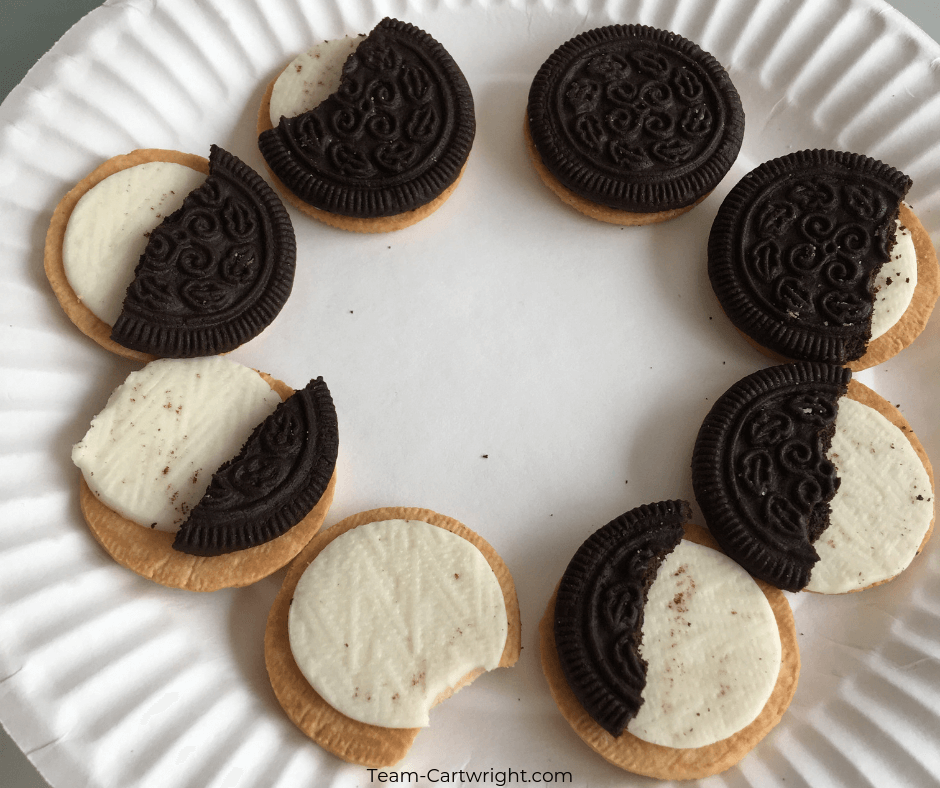 The phases of the moon as made by cookies! Moon activities for preschoolers #MoonSTEM #MoonScience #MoonActivities #MoonPhases Team-Cartwright.com