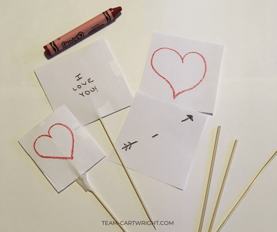 Learn how to make Thaumatropes for kids! These simple Valentine's Day cards create a classic optical illusion that will wow their friends. #STEAM #ValentinesDayCard #Thaumatrope #STEMActivity #ValentineSTEM #ValentineCraft #HomemadeValentine Team-Cartwright.com