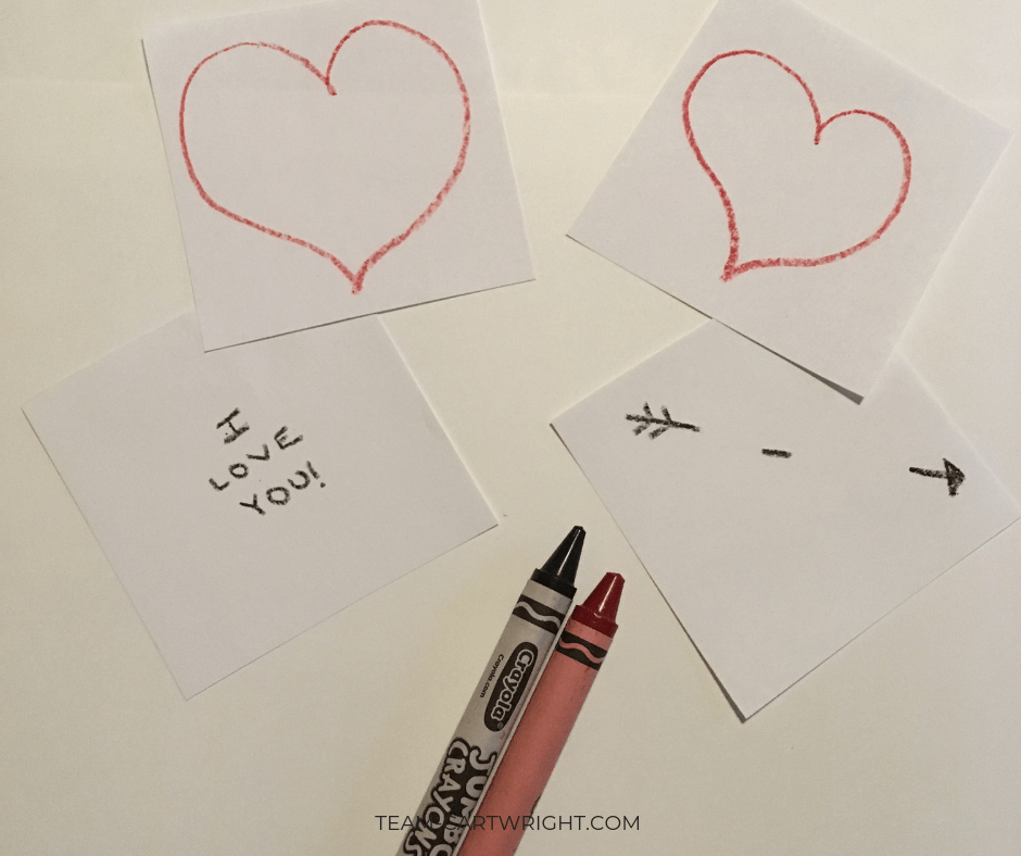 Step one of making a thaumatrope: Draw your images. (Hint, lightly trace the heart onto both pieces of paper. Then erase it off the one you aren't filling in with crayon.) #Thaumatropes #ValentineCards #STEM #ValentineSTEM #OpticalIllusion Team-Cartwright.com