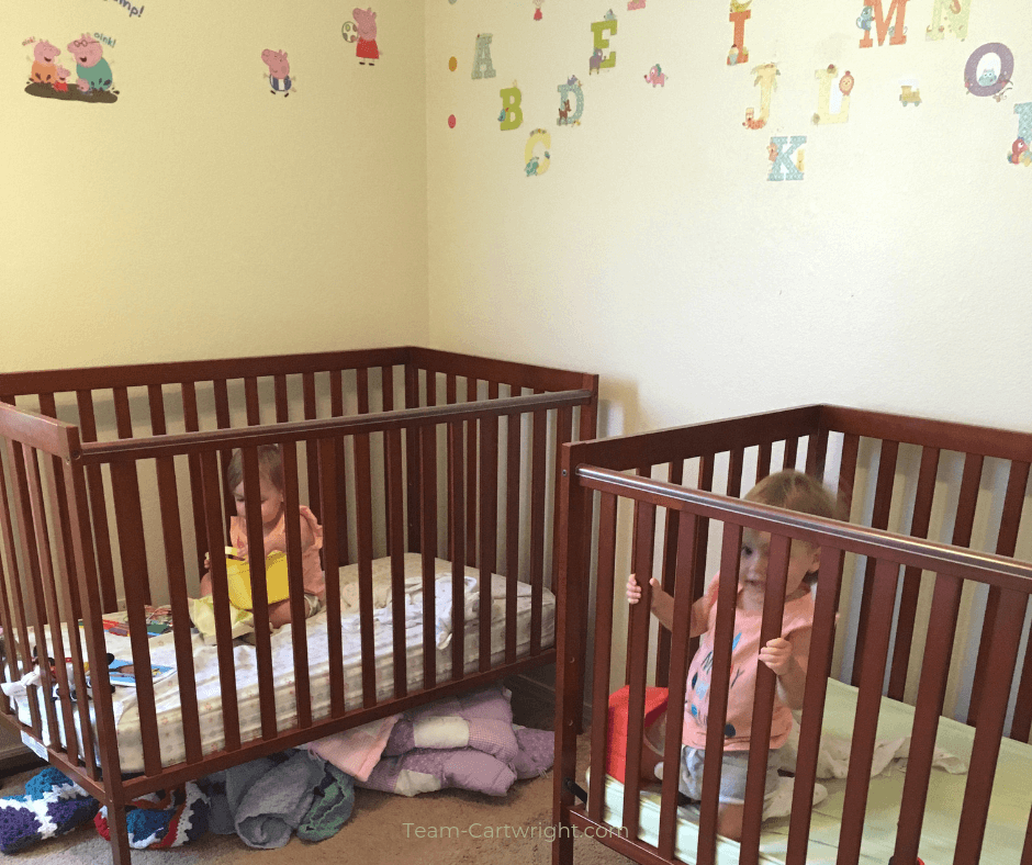 newborn twins in same crib