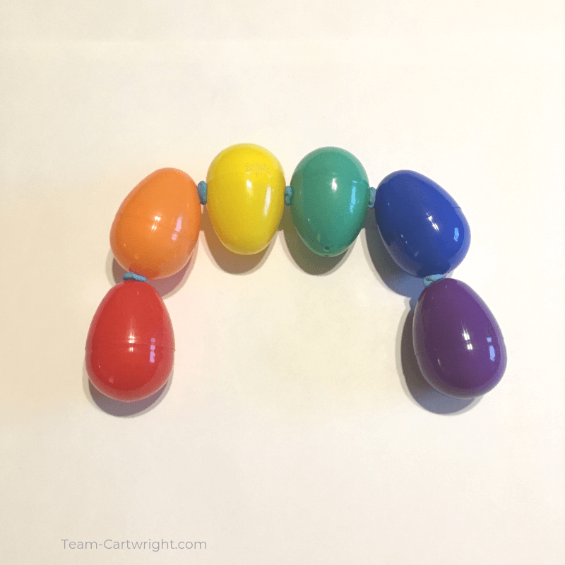 picture of colorful easter eggs put together to make a bridge