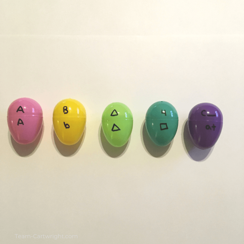 picture of easter eggs with matching letters, shapes, and numbers for toddler learning