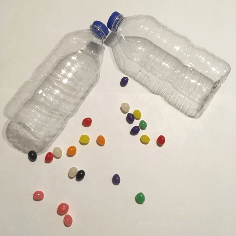 picture of 2 empty water bottles and jelly beans