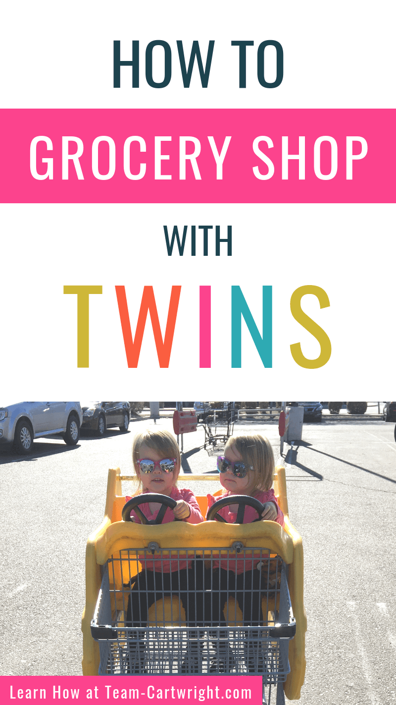 How to grocery shop with twins and picture of twins in a shopping cart.