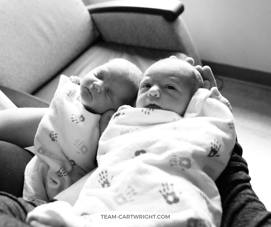 black and white picture of newborn twins