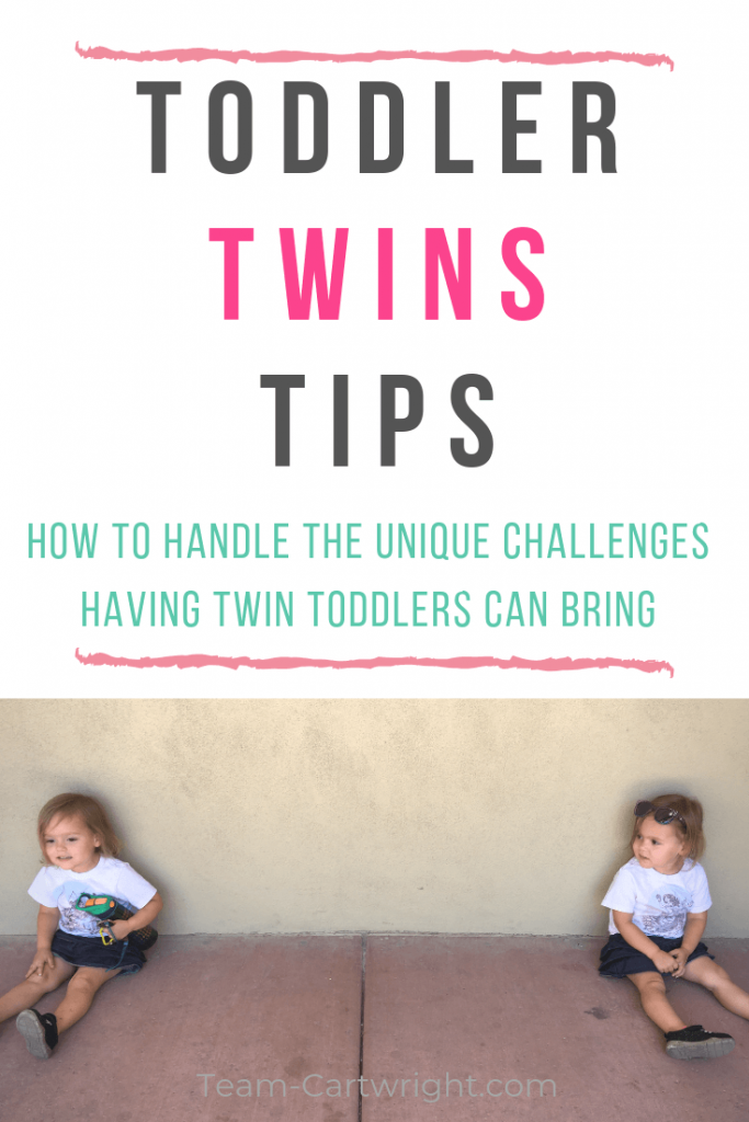 picture of twins sitting against a wall with text overlay: Toddler Twins Tips How to handle the unique challenges having twin toddlers can bring