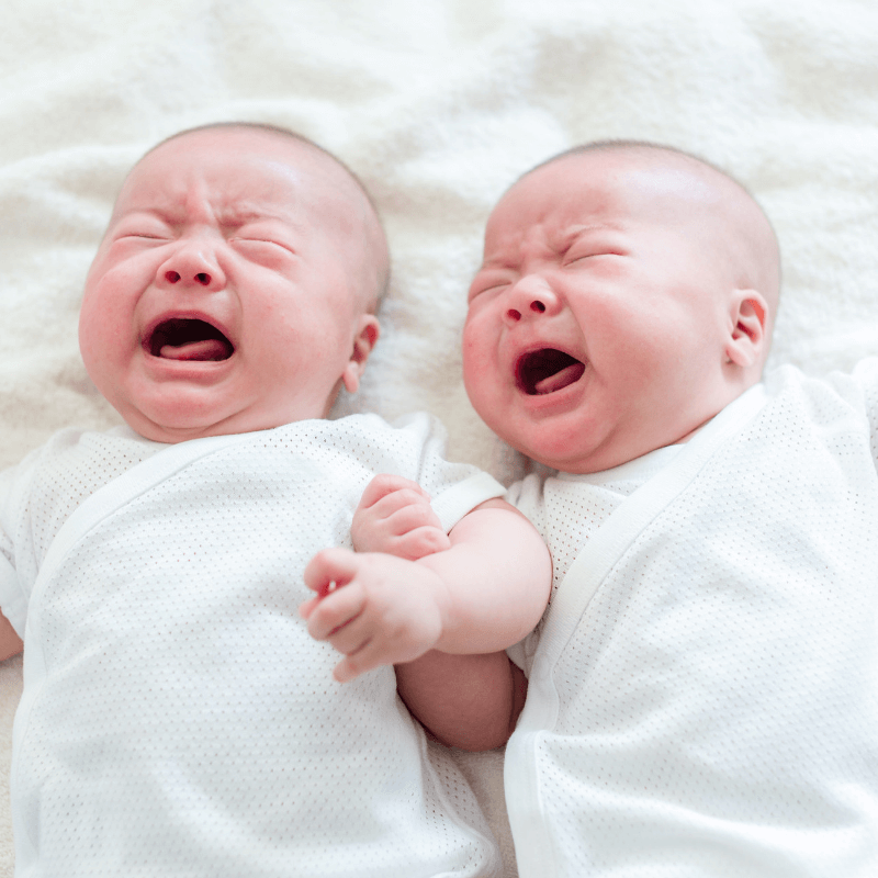 picture of twin babies crying