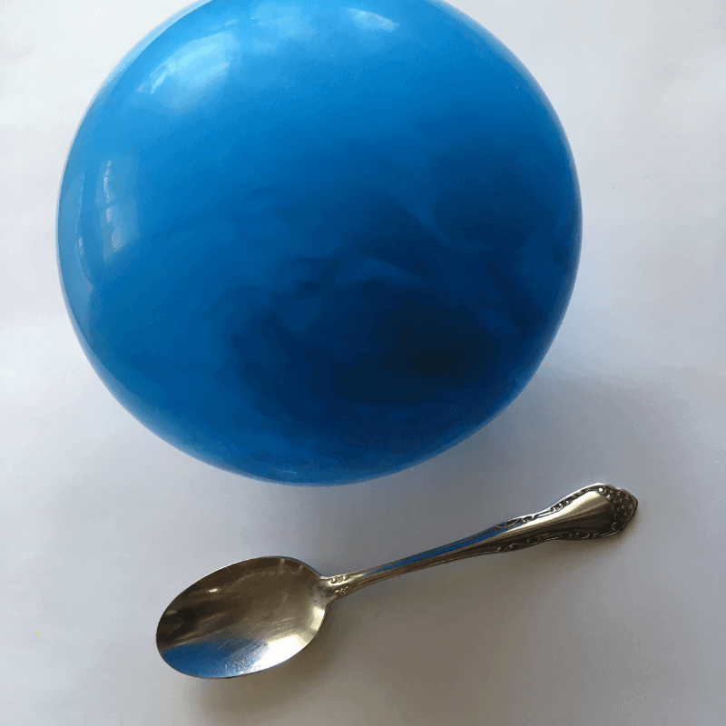 picture of a blue balloon and a spoon