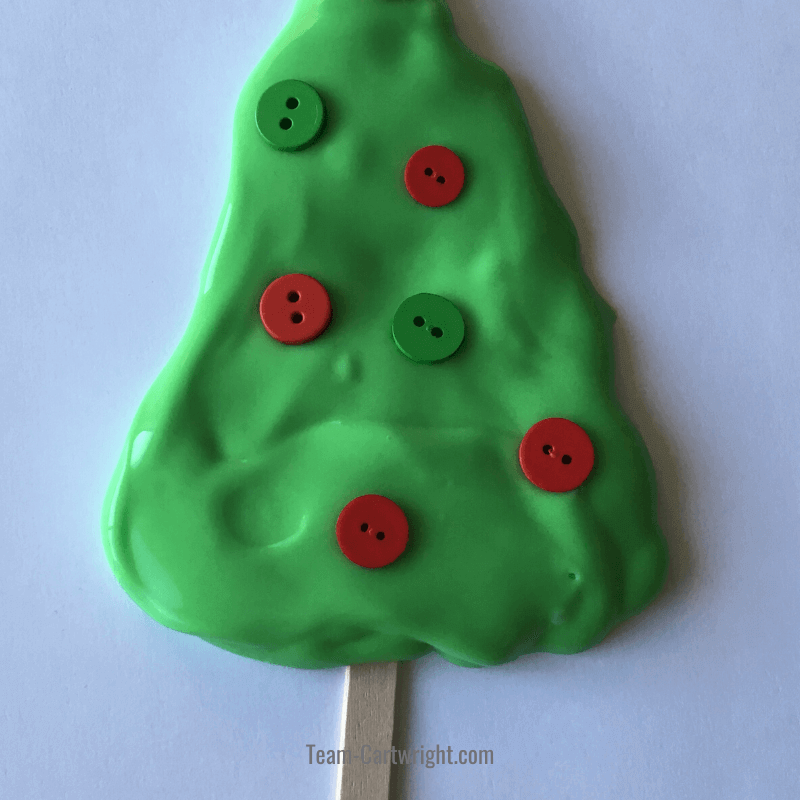 slime christmas tree activity with button ornaments 