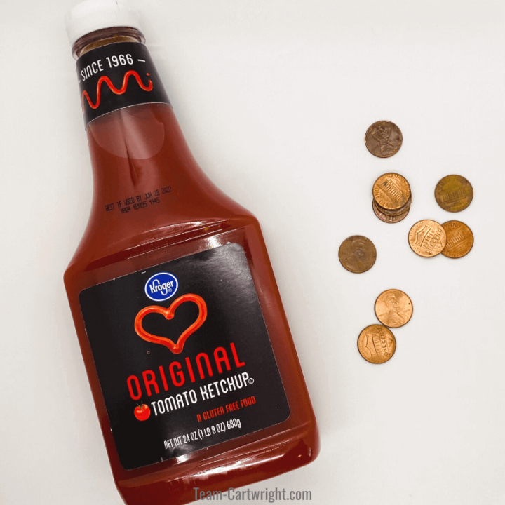 picture of bottle of ketchup with pennies for cleaning pennies with ketchup science experiment for kids